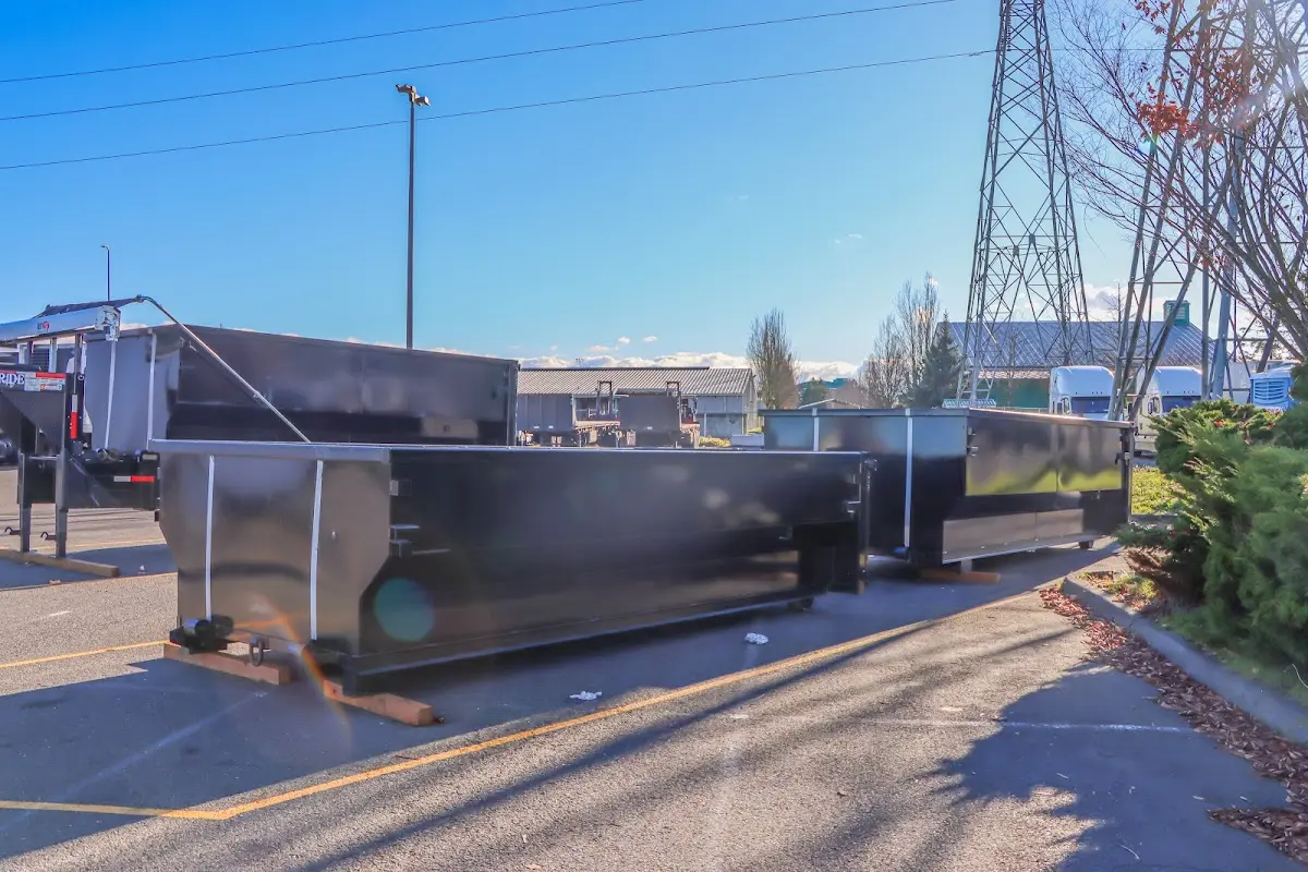 Roll-off dumpster ready for waste disposal at job site for Concrete Dumpster Rental in River Forest